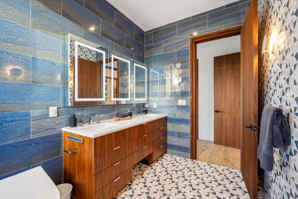 Bathroom, Dual Sink Vanities, Glass Shower, Interior, Recessed Lighting, Wood Texture Flooring