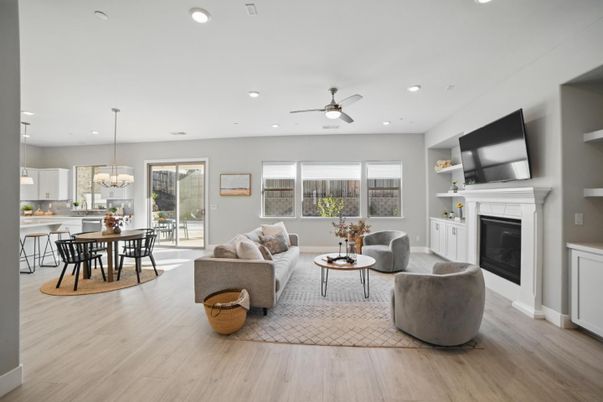 Dining room, Fireplace, Interior, Living room, Pendant Lights, Recessed Lighting, Wood Texture Flooring