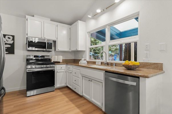 Interior, Kitchen, Recessed Lighting, Stainless Steel Appliances, Wood Texture Flooring