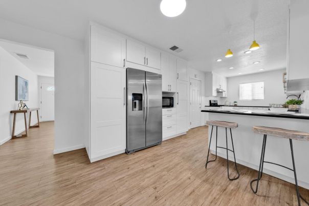 Interior, Kitchen, Pendant Lights, Recessed Lighting, Stainless Steel Appliances, Wood Texture Flooring