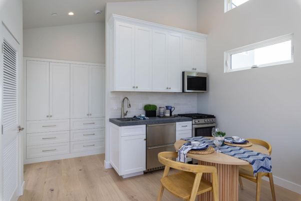 Dining room, Interior, Kitchen, Recessed Lighting, Stainless Steel Appliances, Wood Texture Flooring