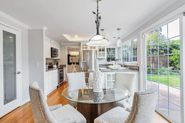 Dining room, Interior, Kitchen, Pendant Lights, Recessed Lighting, Stainless Steel Appliances, Wood Texture Flooring