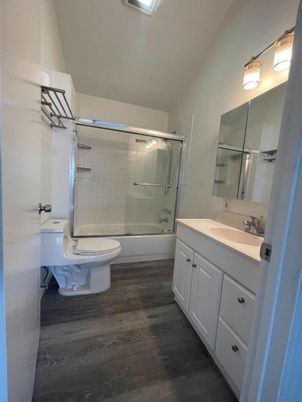 Bathroom, Dual Sink Vanities, Glass Shower, Interior, Wood Texture Flooring