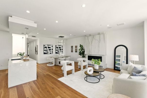 Dining room, Fireplace, Interior, Living room, Marble Walls, Pendant Lights, Recessed Lighting, Wood Texture Flooring