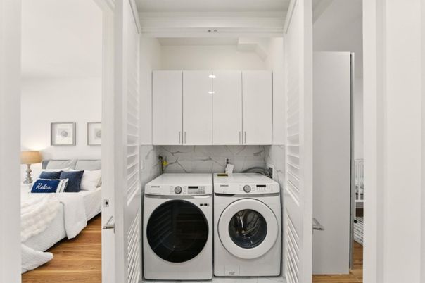 Bedroom, Interior, Marble Walls, Utility Closets, Washer, Wood Texture Flooring