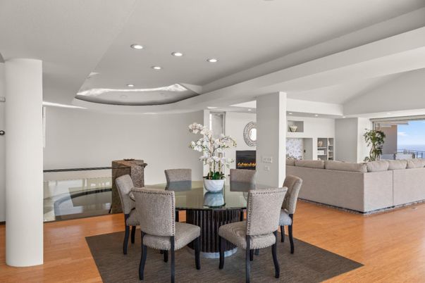 Dining room, Fireplace, Interior, Living room, Recessed Lighting, Water, Wood Texture Flooring