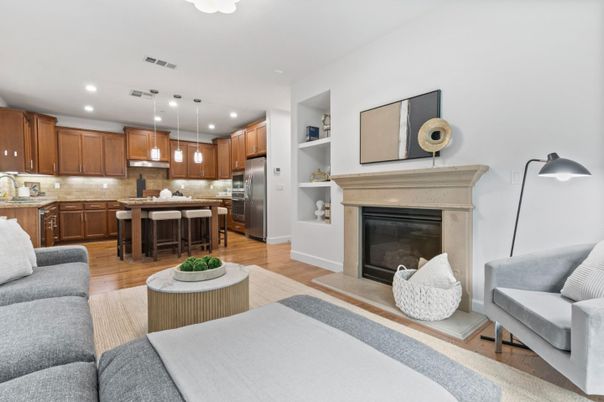 Fireplace, Interior, Kitchen, Living room, Pendant Lights, Recessed Lighting, Stainless Steel Appliances, Wood Texture Flooring