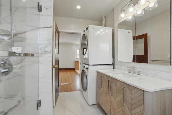 Bathroom, Interior, Marble Walls, Recessed Lighting, Utility Closets, Washer