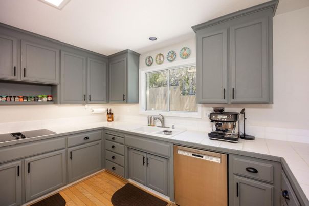 Interior, Kitchen, Recessed Lighting, Tile Countertops, Wood Texture Flooring