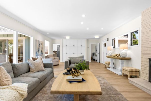 Fireplace, Interior, Living room, Recessed Lighting, Stone Walls, Wood Texture Flooring