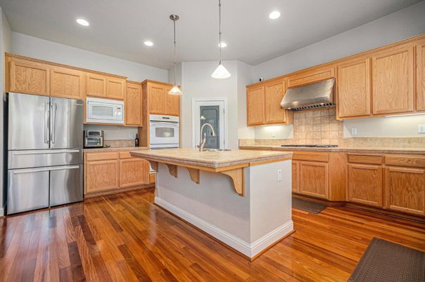 Interior, Kitchen, Pendant Lights, Recessed Lighting, Stainless Steel Appliances, Wood Texture Flooring