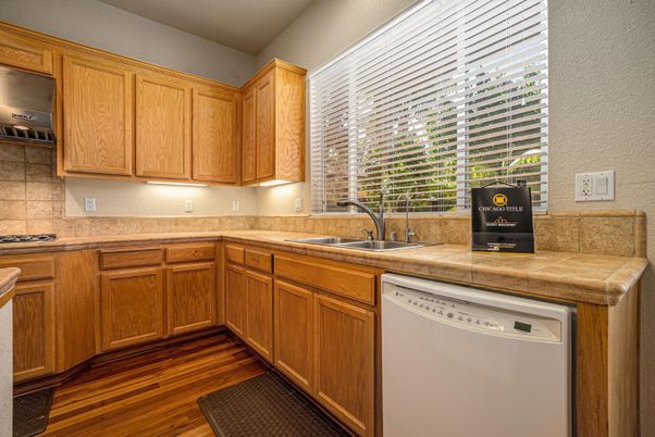 Interior, Kitchen, Tile Countertops, Wood Texture Flooring
