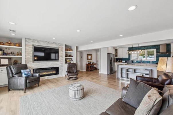 Fireplace, Interior, Kitchen, Living room, Pendant Lights, Recessed Lighting, Stone Walls, Wood Texture Flooring