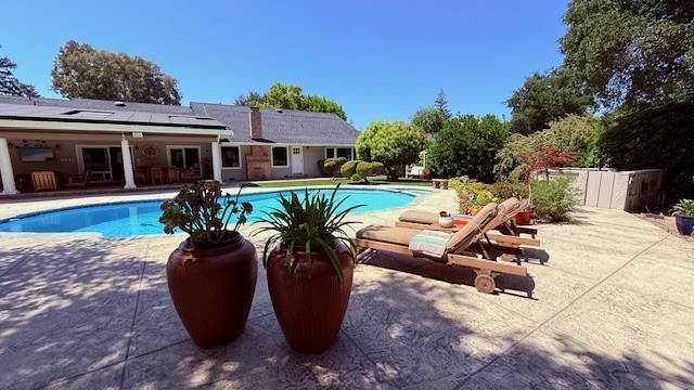 Exterior, Pool, Solar Panels