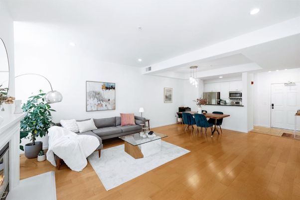 Dining room, Fireplace, Interior, Kitchen, Living room, Pendant Lights, Recessed Lighting, Stainless Steel Appliances, Wood Texture Flooring