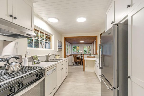 Dining room, Interior, Kitchen, Recessed Lighting, Stainless Steel Appliances, Wood Texture Flooring