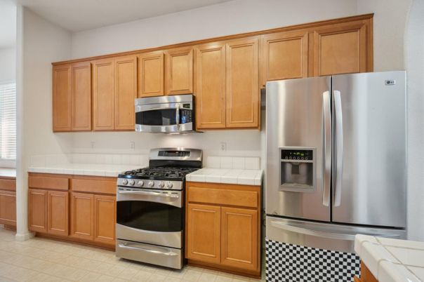 Interior, Kitchen, Stainless Steel Appliances, Tile Countertops