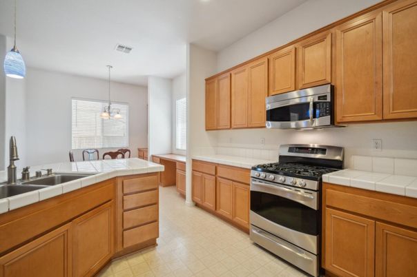 Dining room, Interior, Kitchen, Pendant Lights, Recessed Lighting, Stainless Steel Appliances, Tile Countertops