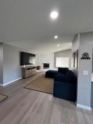 Fireplace, Interior, Living room, Recessed Lighting, Wood Texture Flooring