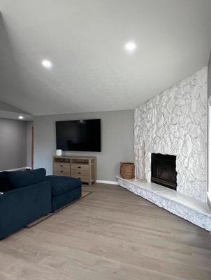 Fireplace, Interior, Living room, Recessed Lighting, Wood Texture Flooring