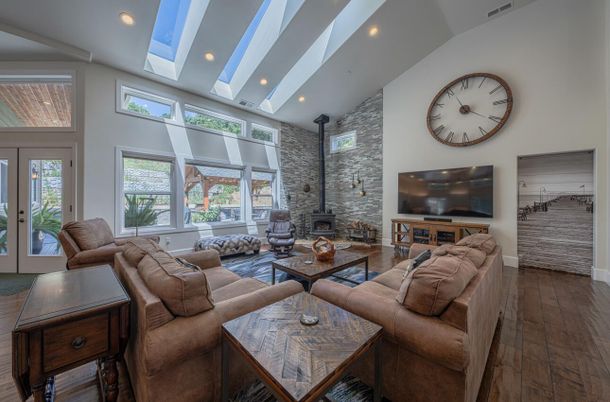 Fireplace, Interior, Living room, Recessed Lighting, Stone Walls, Wood Texture Flooring