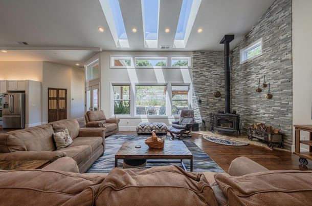 Fireplace, Interior, Living room, Recessed Lighting, Stone Walls, Wood Texture Flooring