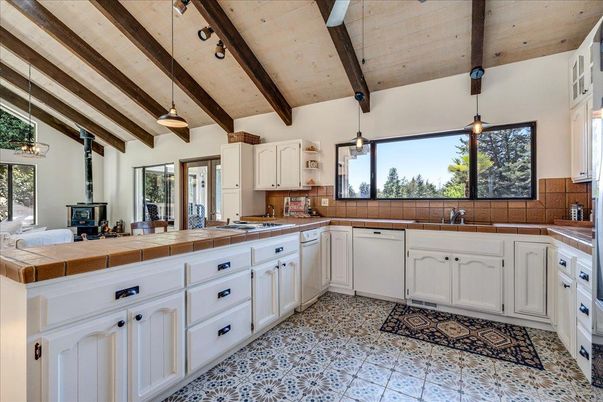 Interior, Kitchen, Pendant Lights, Tile Countertops, Wooden Beams
