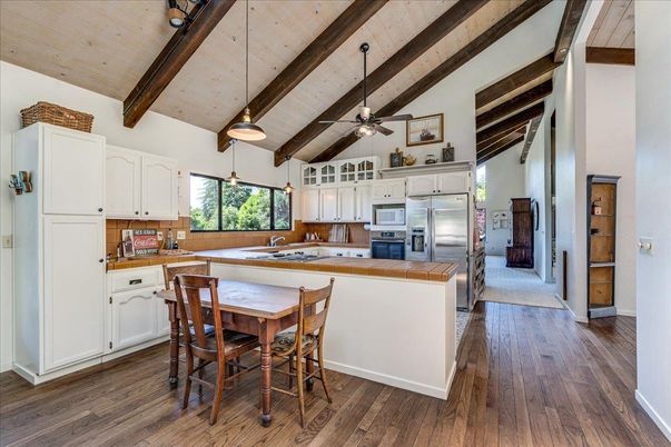 Dining room, Interior, Kitchen, Pendant Lights, Stainless Steel Appliances, Wooden Beams, Wooden Ceilings, Wood Texture Flooring
