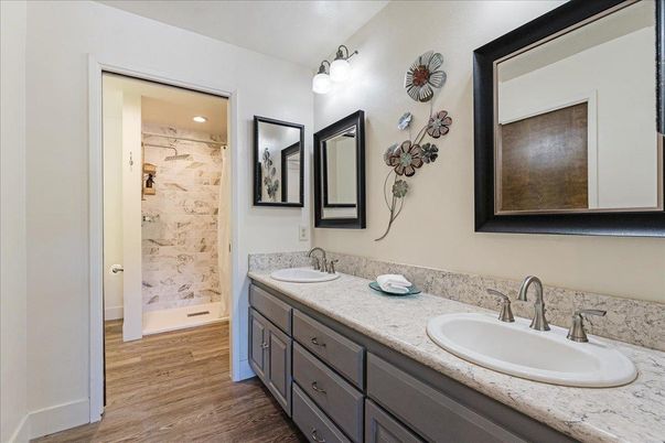Bathroom, Dual Sink Vanities, Interior, Recessed Lighting, Wood Texture Flooring