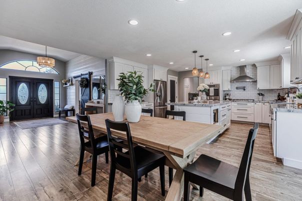 Dining room, Interior, Kitchen, Pendant Lights, Recessed Lighting, Stainless Steel Appliances, Wood Texture Flooring