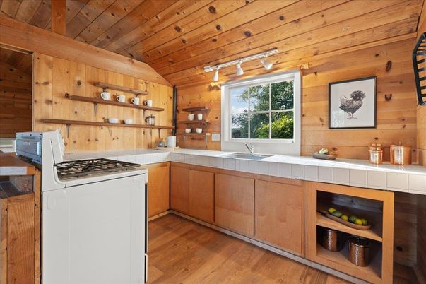 Interior, Kitchen, Tile Countertops, Wooden Ceilings, Wood Texture Flooring, Wooden Walls
