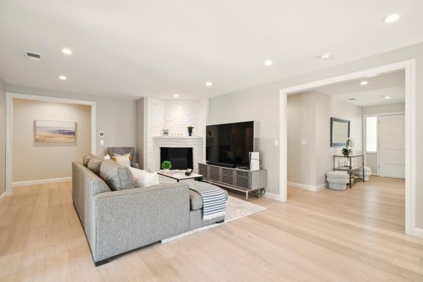 Fireplace, Interior, Living room, Recessed Lighting, Stone Walls, Wood Texture Flooring