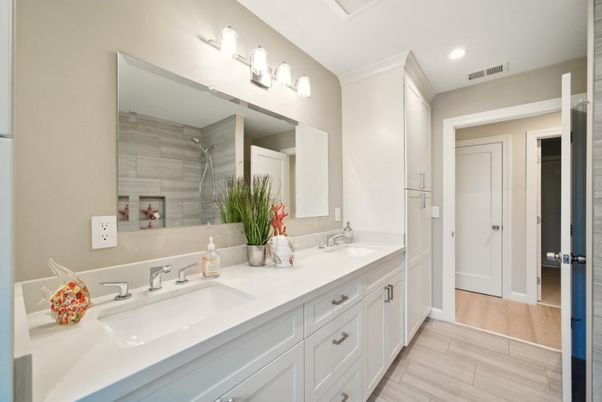 Bathroom, Dual Sink Vanities, Interior, Recessed Lighting, Wood Texture Flooring