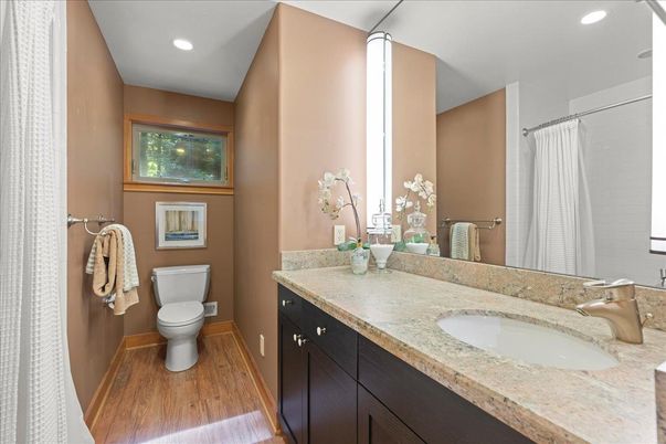 Bathroom, Dual Sink Vanities, Interior, Recessed Lighting, Wood Texture Flooring