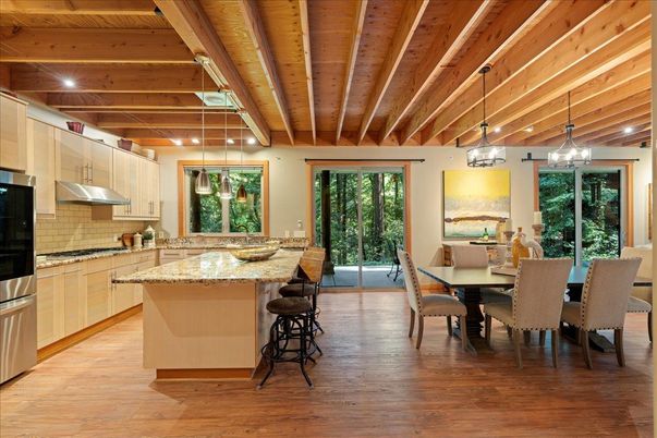 Dining room, Interior, Kitchen, Pendant Lights, Recessed Lighting, Stainless Steel Appliances, Wooden Beams, Wooden Ceilings, Wood Texture Flooring