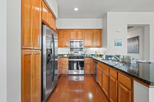 Interior, Kitchen, Recessed Lighting, Stainless Steel Appliances, Wood Texture Flooring