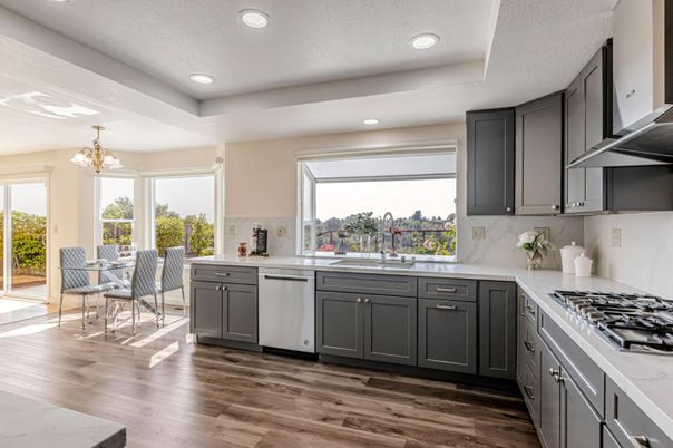 Chandelier, Dining room, Interior, Kitchen, Recessed Lighting, Stainless Steel Appliances, Wood Texture Flooring
