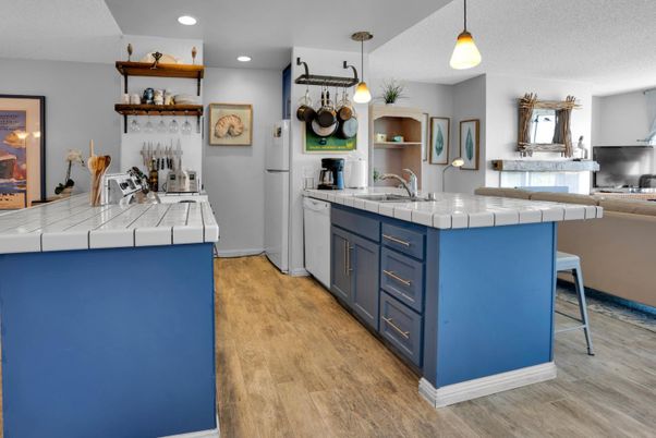 Interior, Kitchen, Pendant Lights, Recessed Lighting, Tile Countertops, Wood Texture Flooring