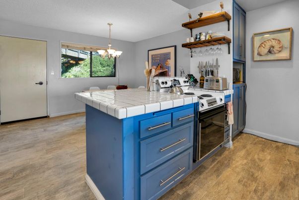 Chandelier, Interior, Kitchen, Pendant Lights, Tile Countertops, Wood Texture Flooring