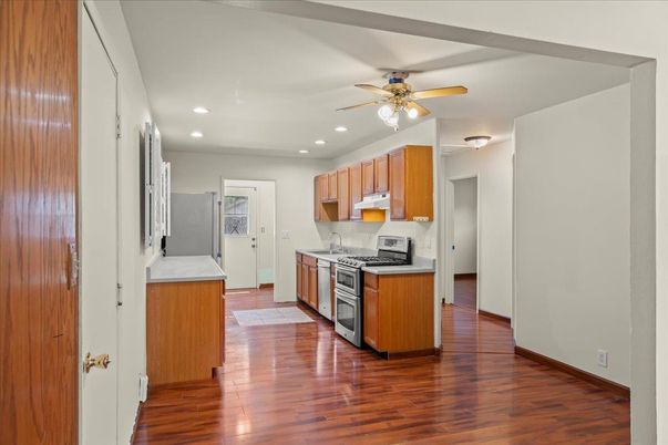 Interior, Kitchen, Recessed Lighting, Stainless Steel Appliances, Wood Texture Flooring