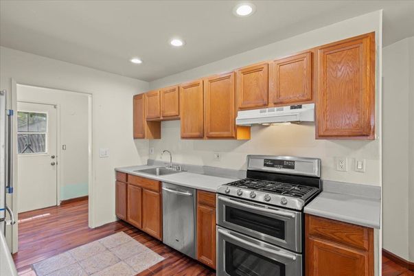 Interior, Kitchen, Recessed Lighting, Stainless Steel Appliances, Wood Texture Flooring