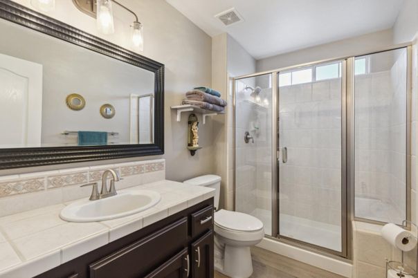 Bathroom, Glass Shower, Interior, Tile Countertops, Wood Texture Flooring