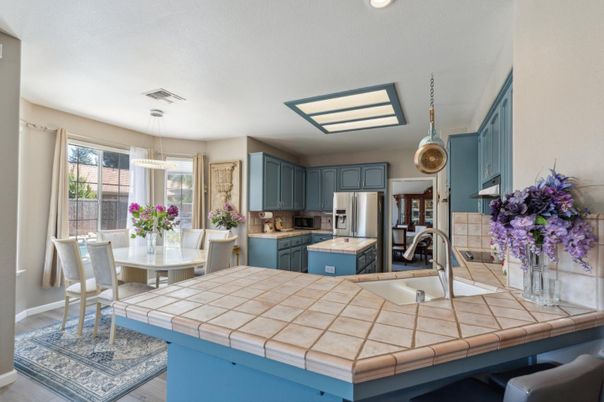 Dining room, Interior, Kitchen, Pendant Lights, Recessed Lighting, Stainless Steel Appliances, Tile Countertops