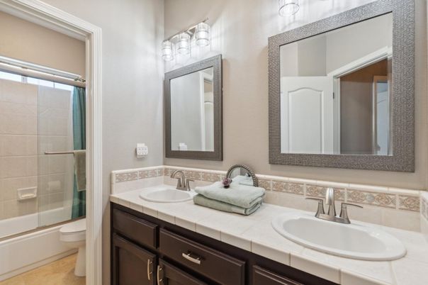 Bathroom, Dual Sink Vanities, Glass Shower, Interior, Tile Countertops