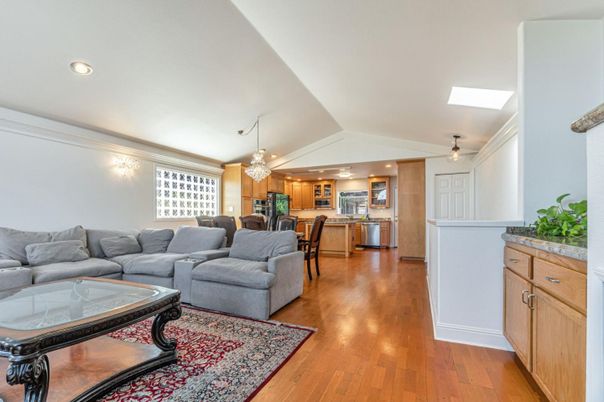 Chandelier, Dining room, Interior, Kitchen, Living room, Recessed Lighting, Stainless Steel Appliances, Wood Texture Flooring