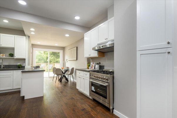 Dining room, Interior, Kitchen, Recessed Lighting, Stainless Steel Appliances, Wood Texture Flooring