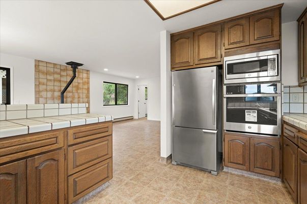 Interior, Kitchen, Recessed Lighting, Tile Countertops
