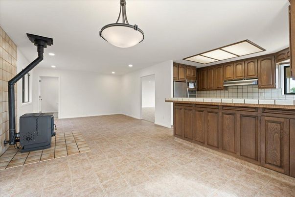 Empty room, Interior, Kitchen, Recessed Lighting, Tile Countertops