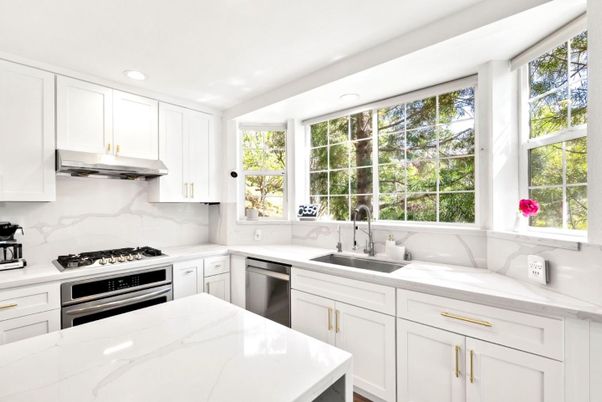 Interior, Kitchen, Marble Walls, Recessed Lighting, Stainless Steel Appliances