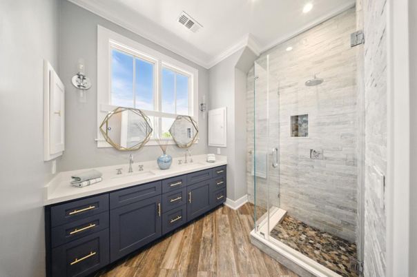 Bathroom, Dual Sink Vanities, Glass Shower, Interior, Recessed Lighting, Wood Texture Flooring